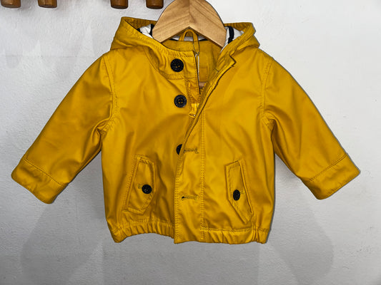 Yellow rainjacket 0-6m