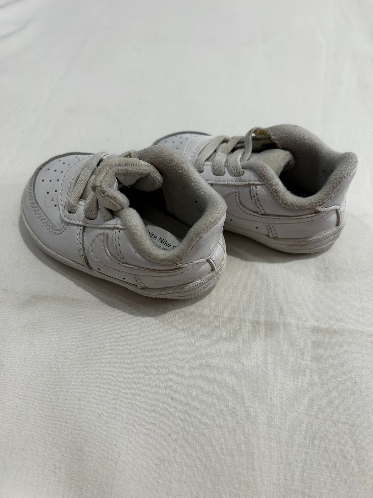 C3 White Nike runners