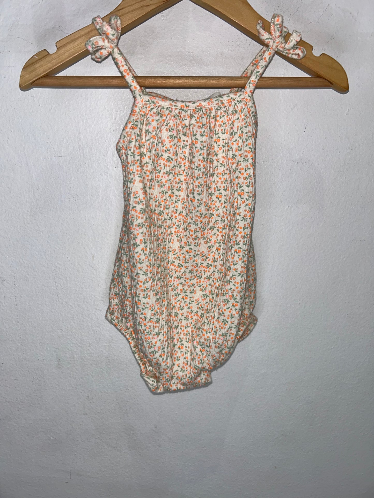 Orange flowers shorty romper 6-9m