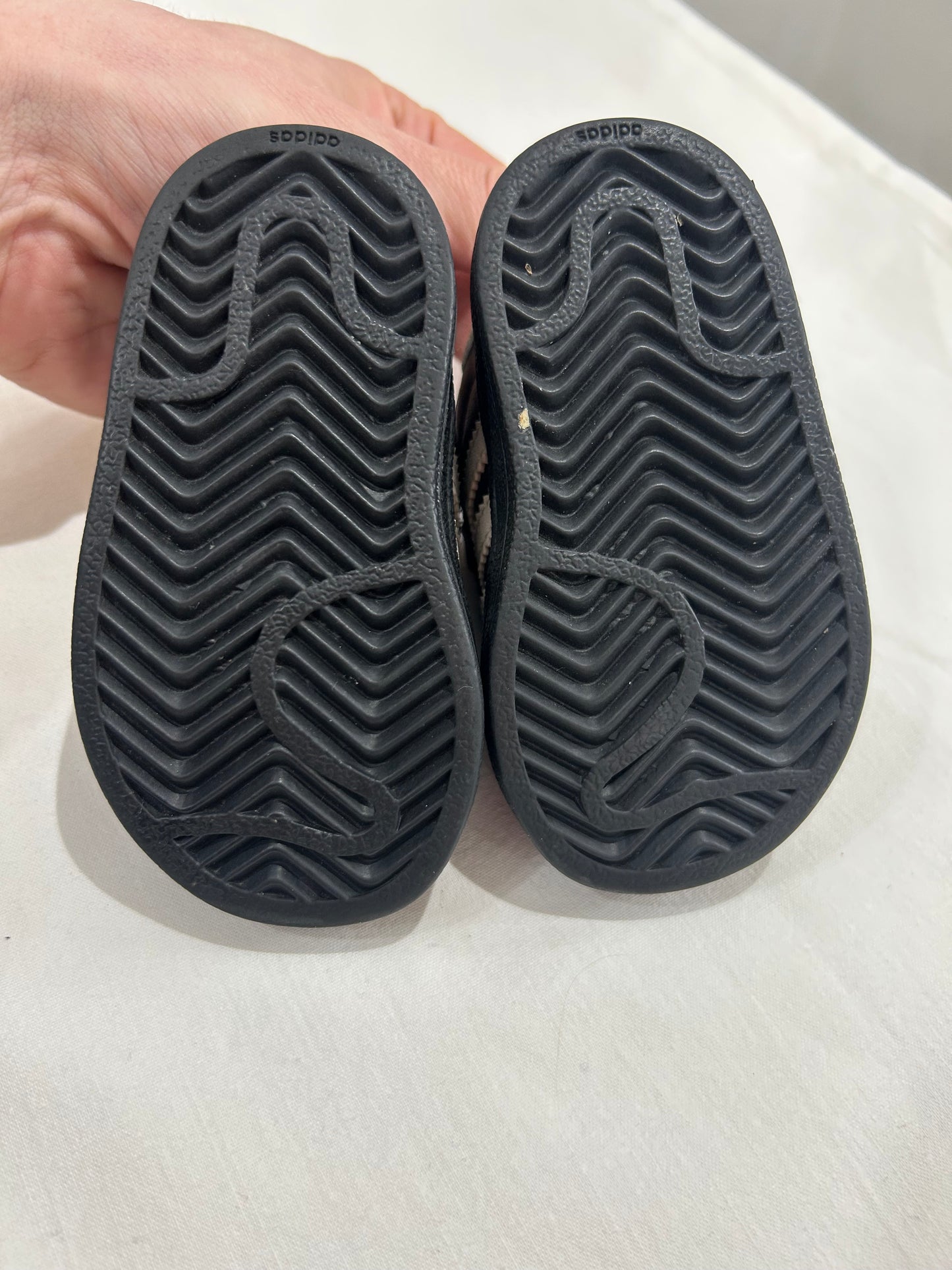 C3 black Adidas sneakers