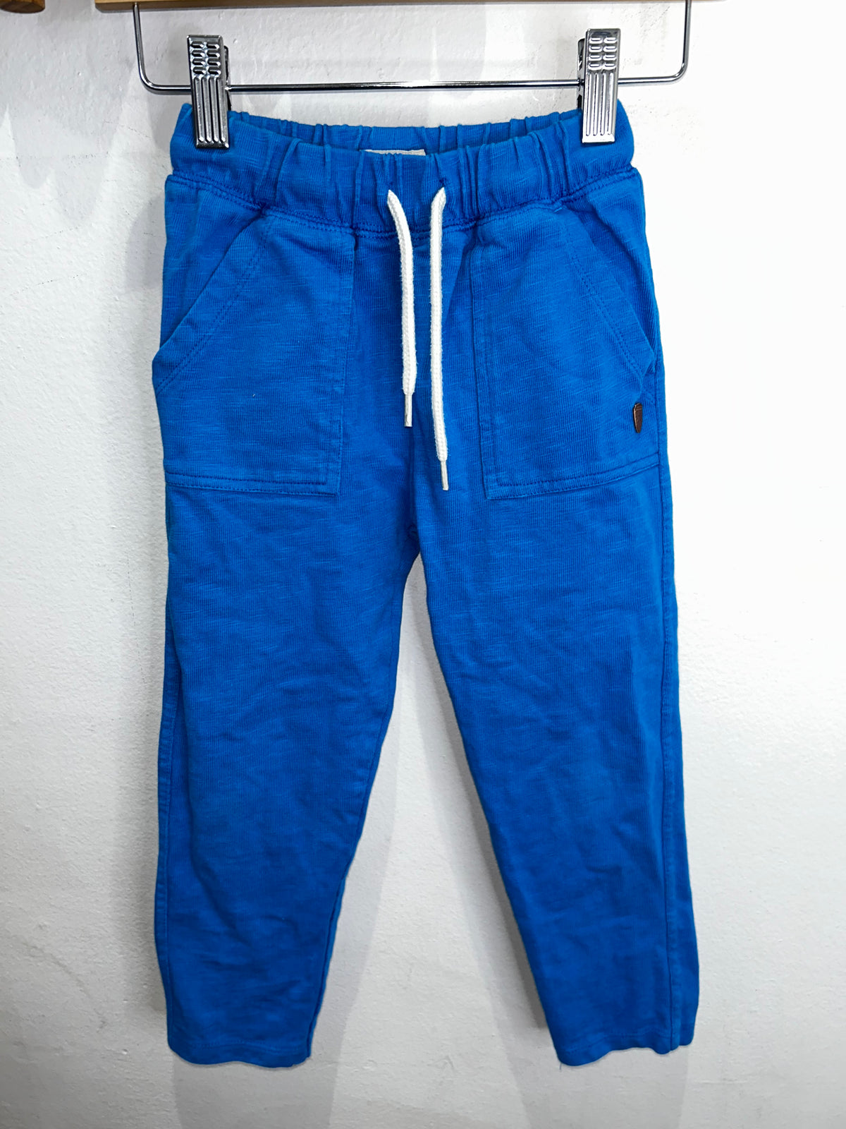 Blue skinny joggers 4y