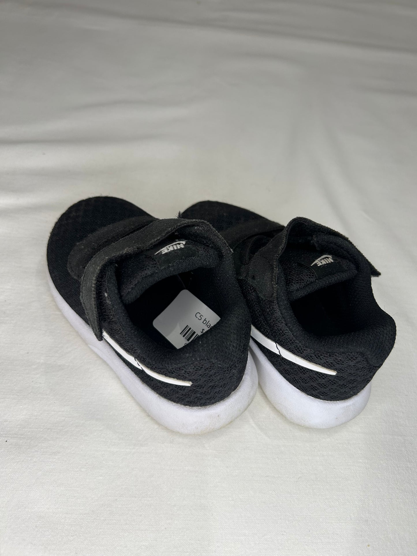 C5 black Nikes