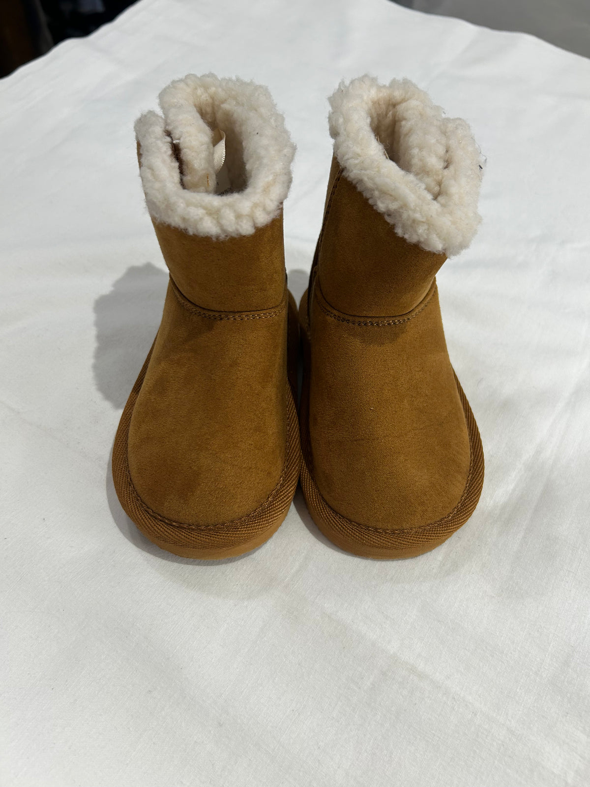 C6 brown furry boots