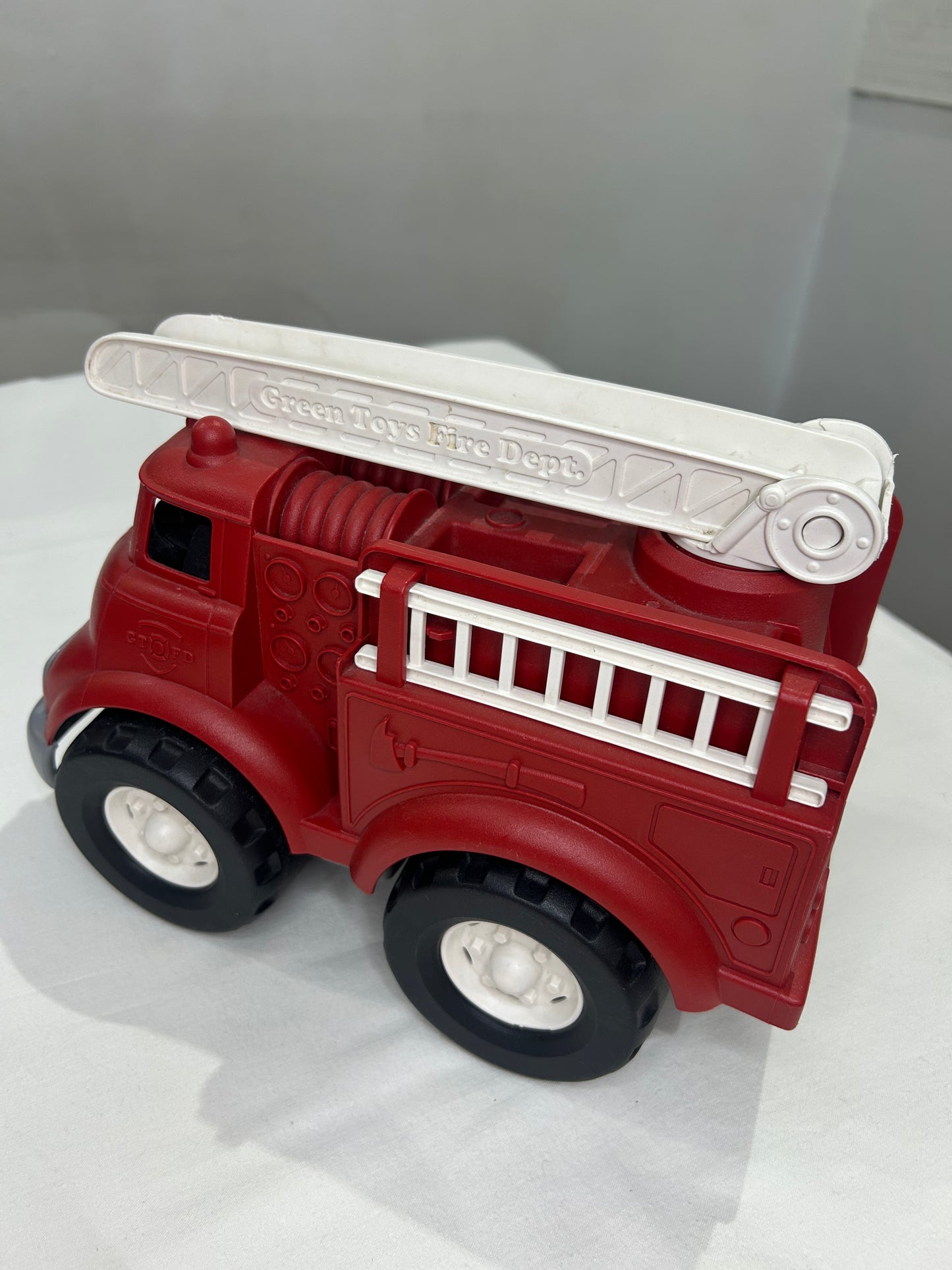 Green Toys red firetruck