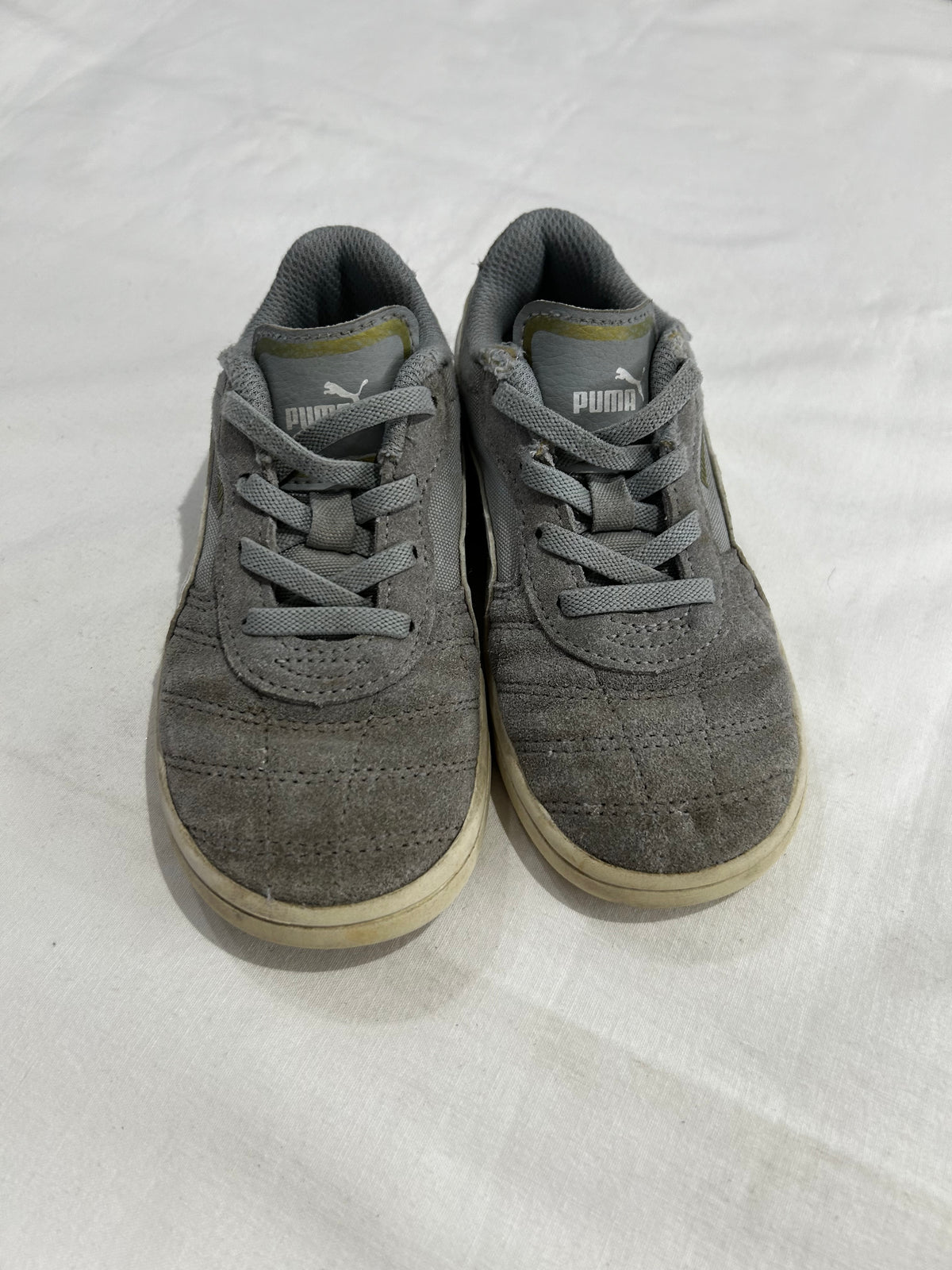 C10 grey canvas pumas*