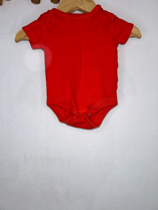 Red onesie 0m