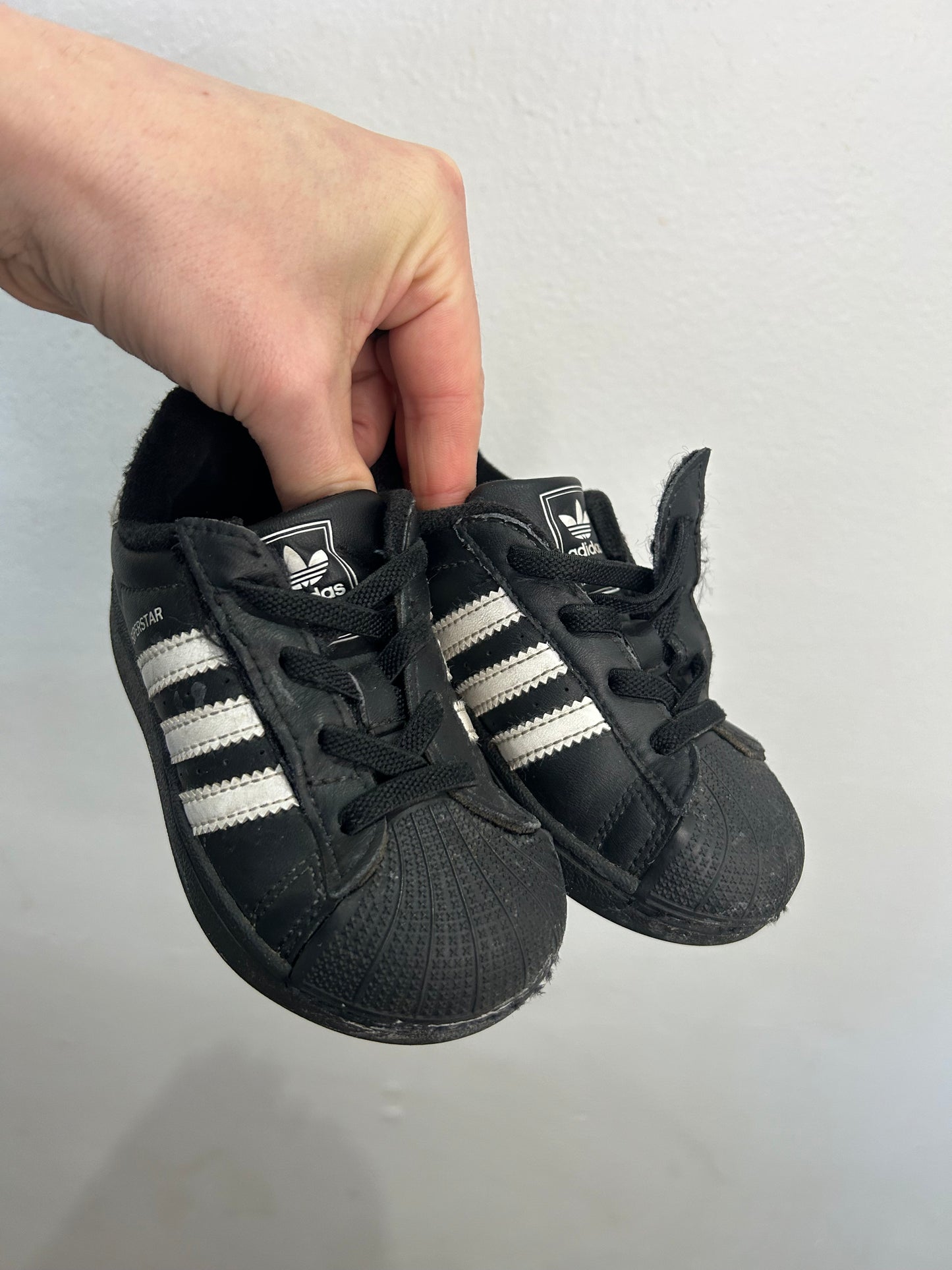 C7 black Adidas runners