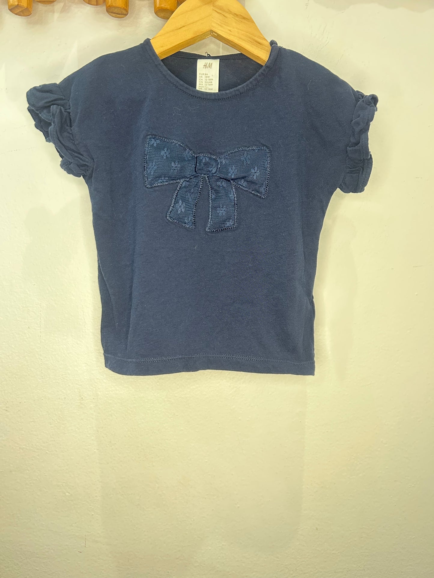 Navy bow tee 12-18m