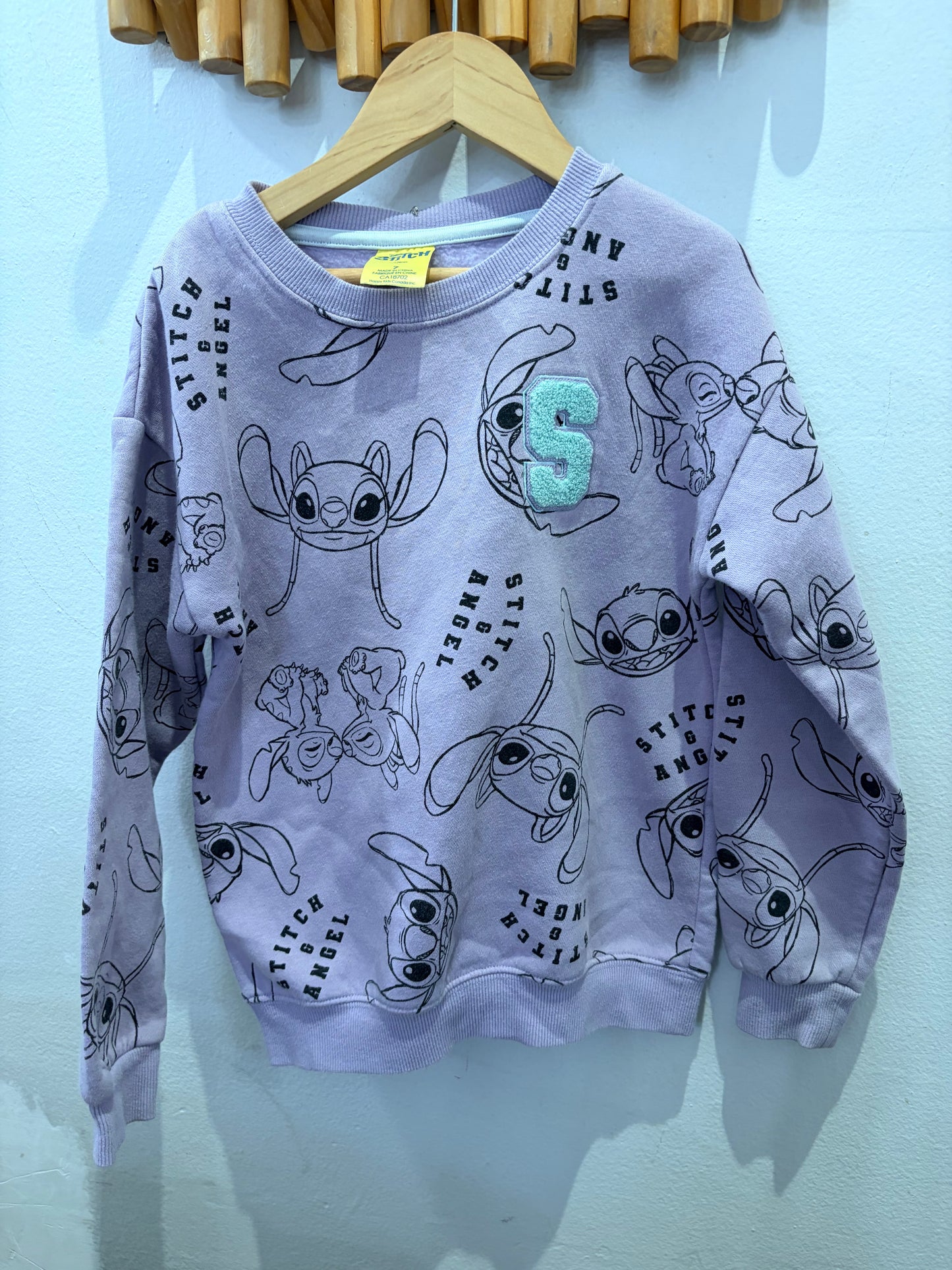 Stitch purple pullover 7y