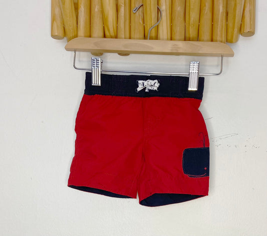 Red board shorts 3-6m