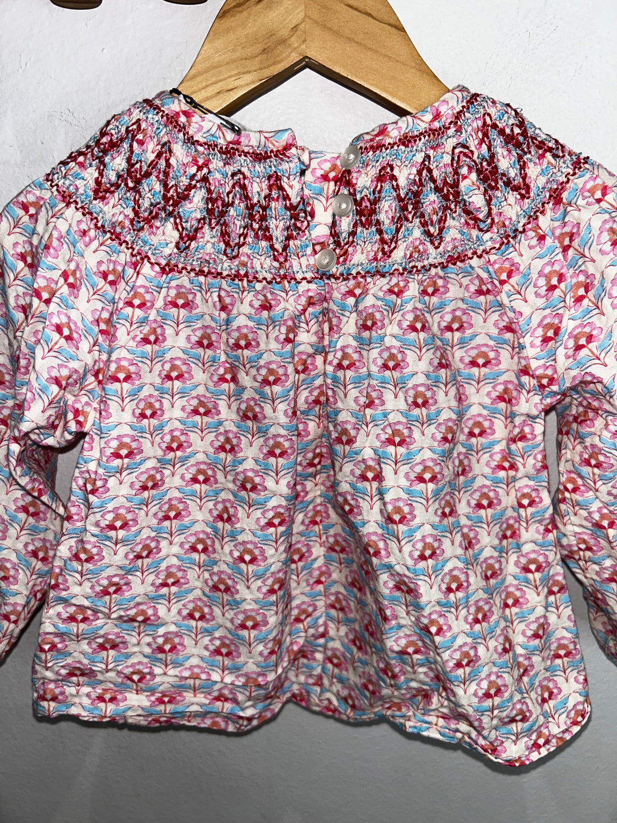 Pink smocked blouse 2y