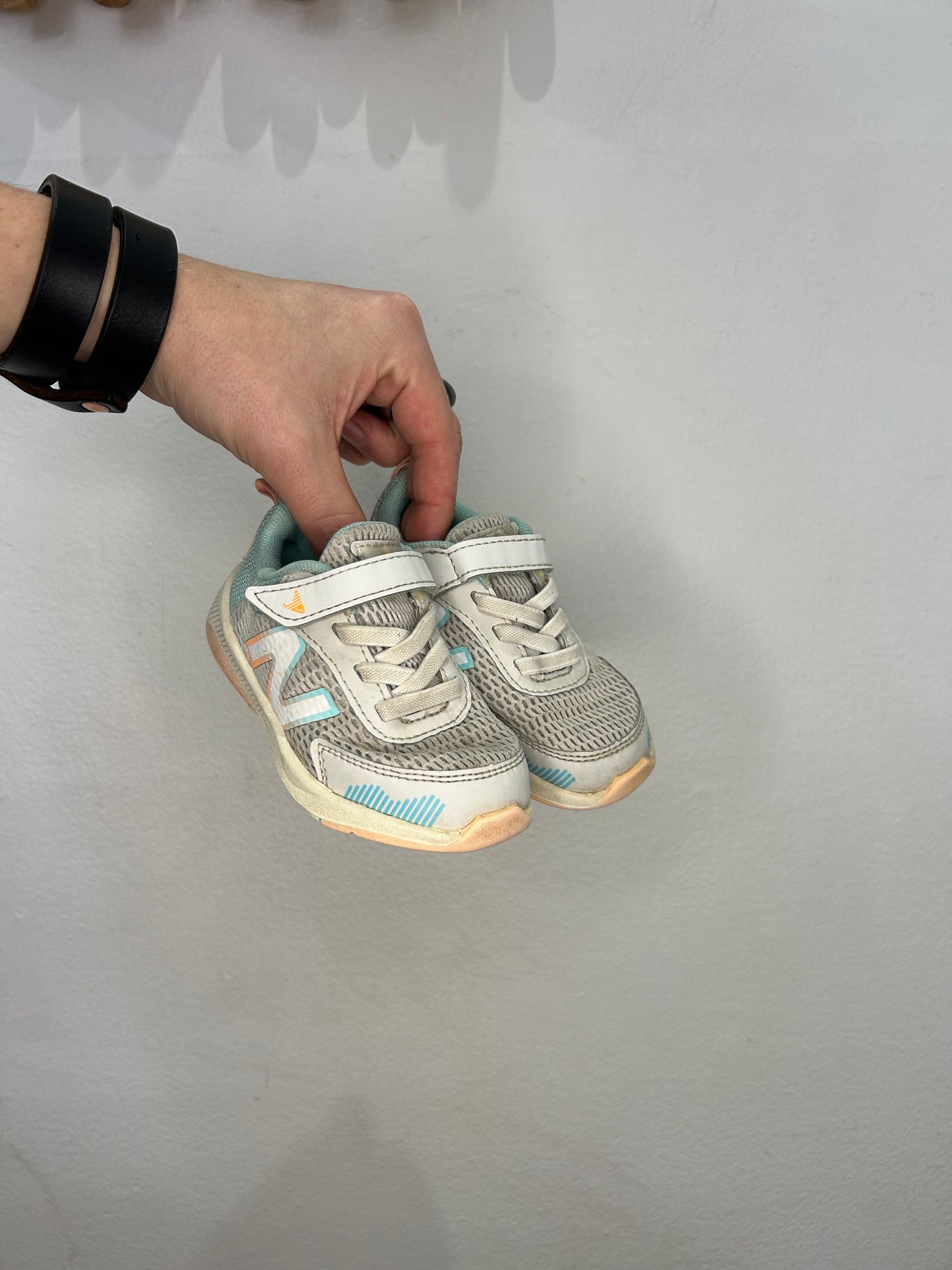 C6 grey New Balance runners