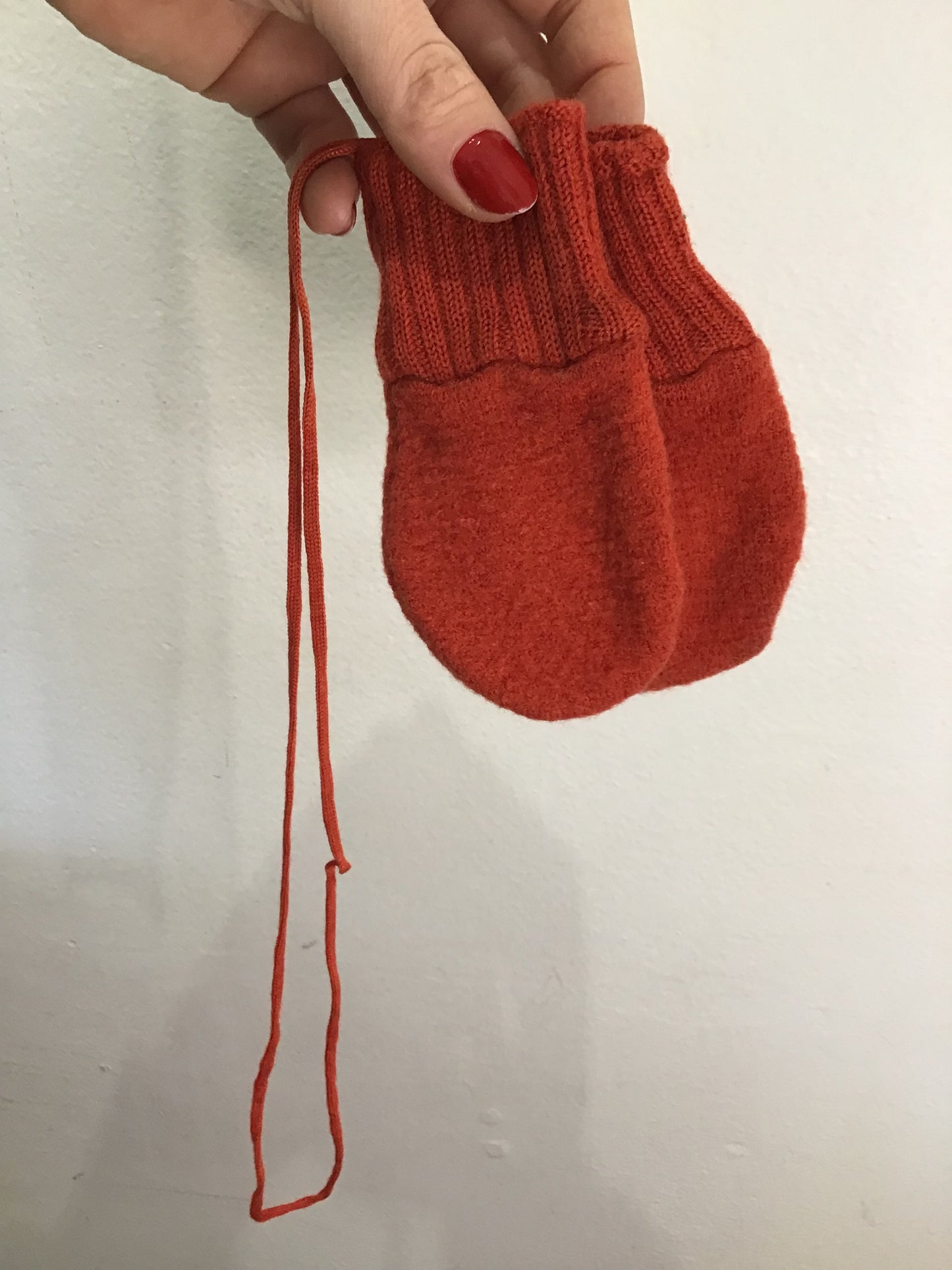 Orange wool mitts 0-24m