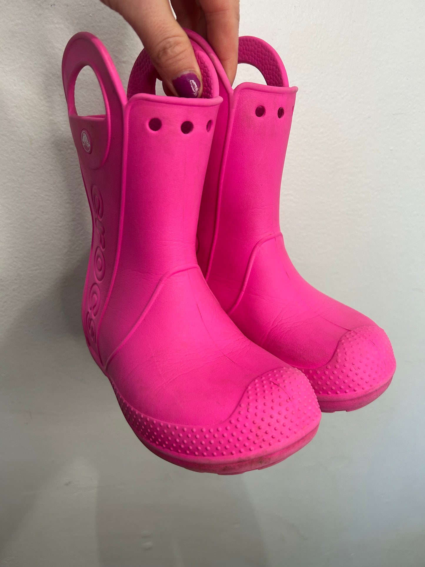 C12 hot pink Croc rain boots