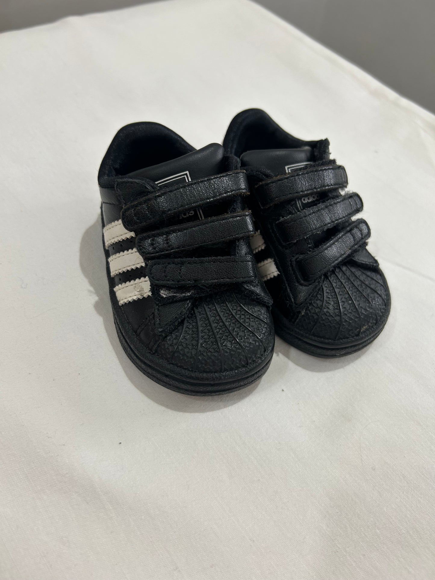 C3 black Adidas sneakers