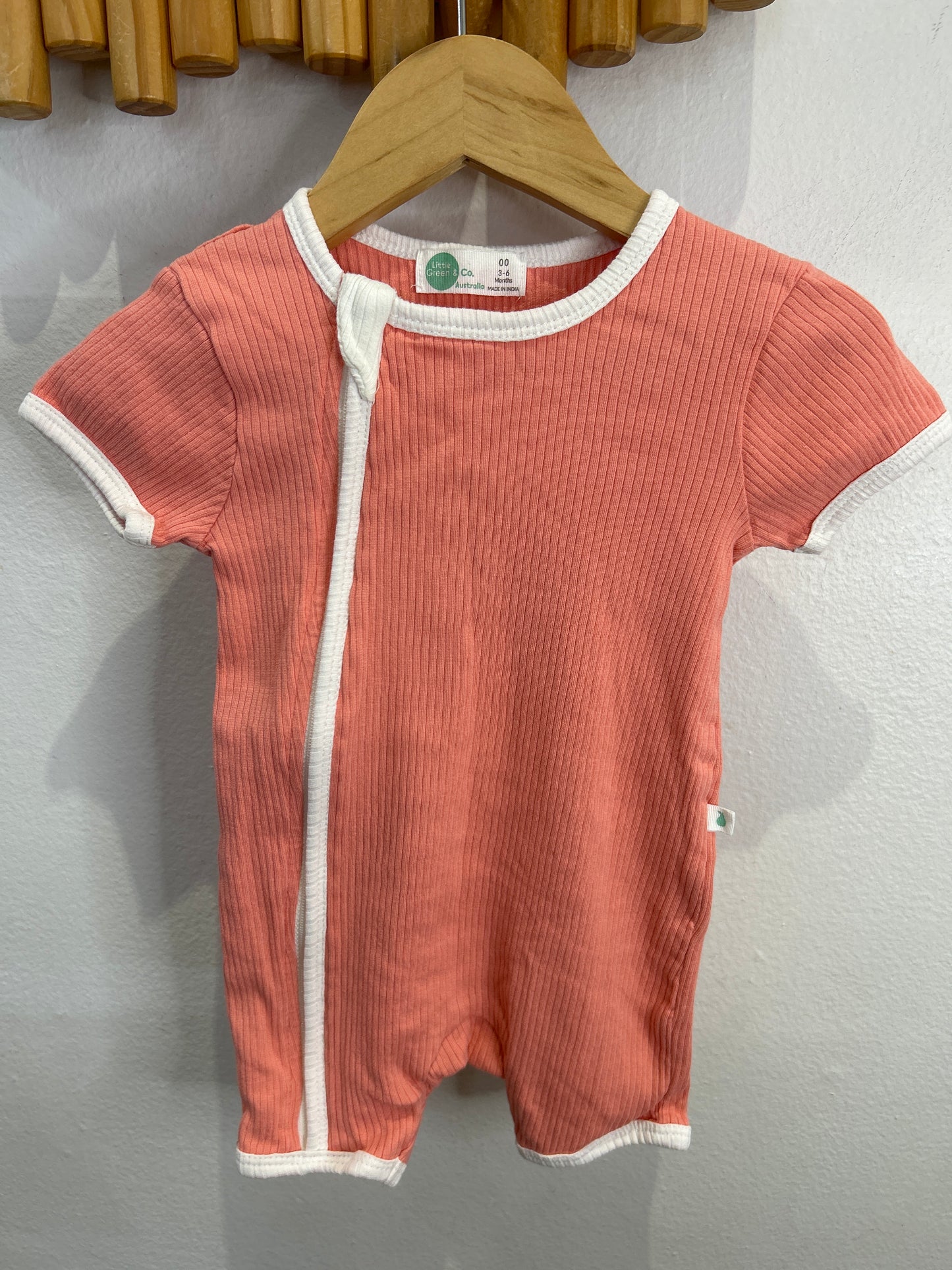 Peach ribbed shorty sleeper 3-6m