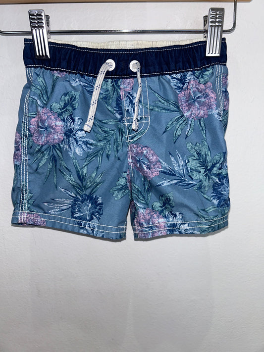 Blue floral swimshorts 12-18m