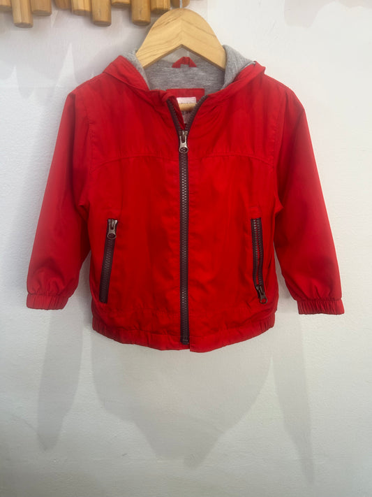 Red rainjacket 12-18m