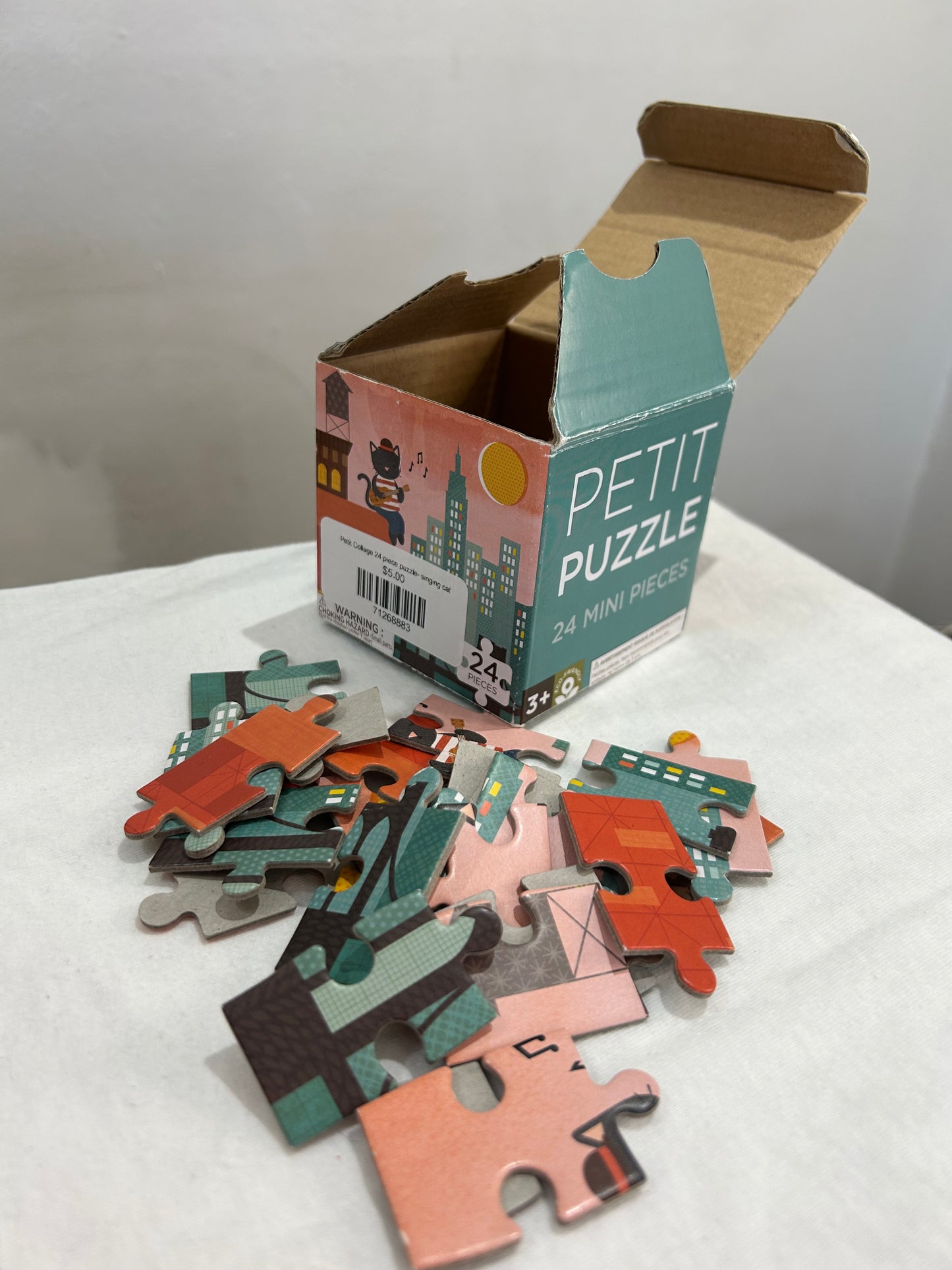 Petit Collage 24 piece puzzle- singing cat