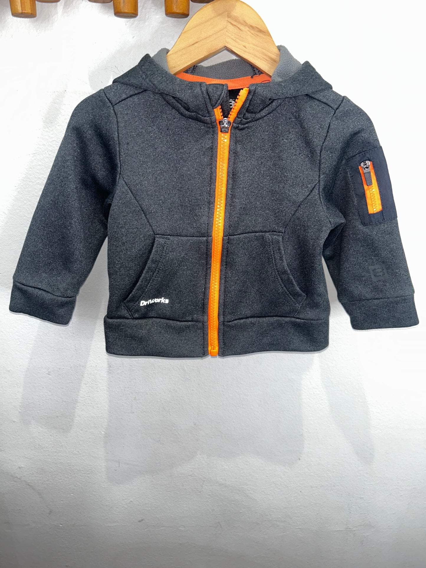 Black and orange zip-up 12m