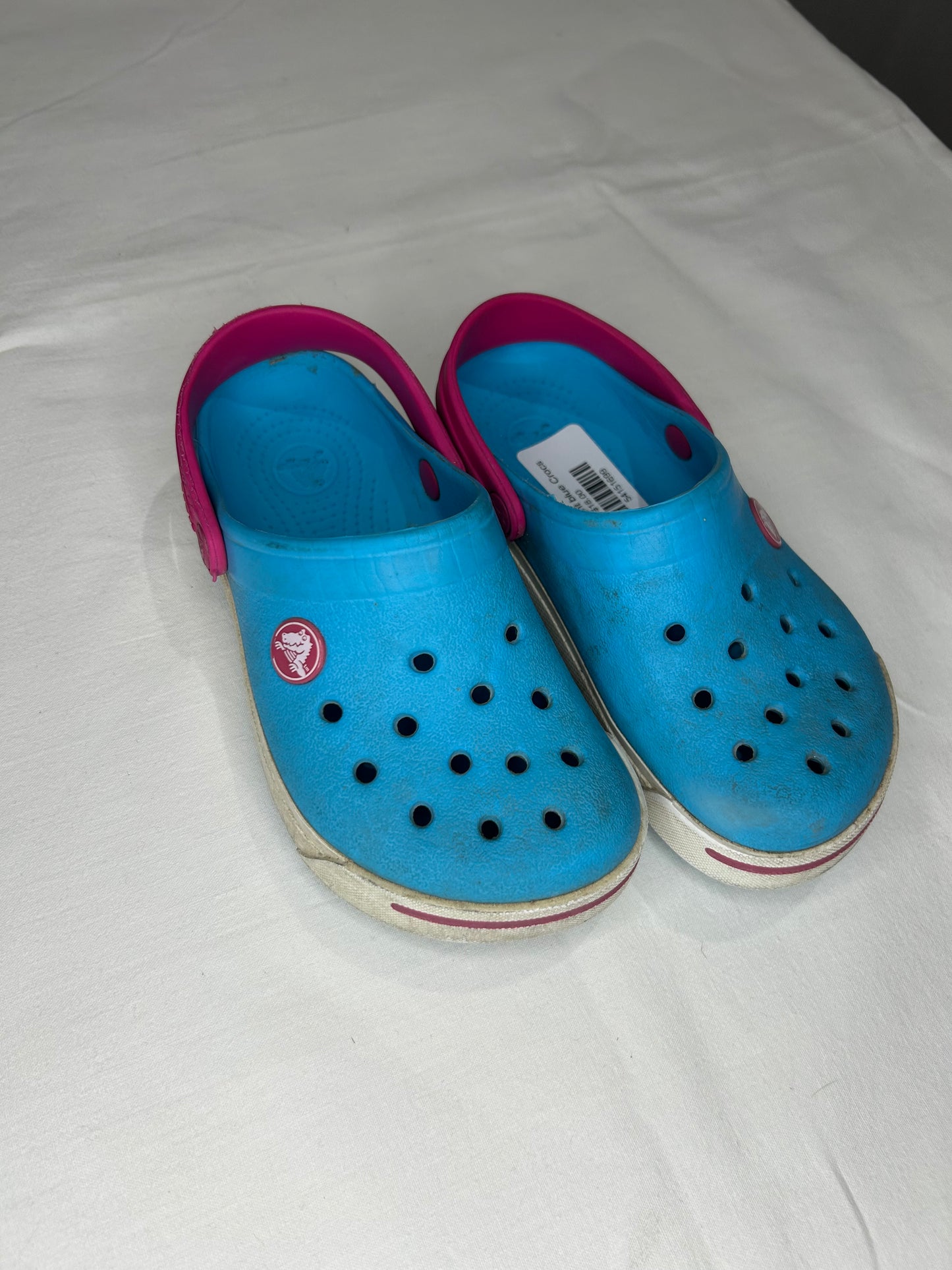 C10-11 light blue Crocs