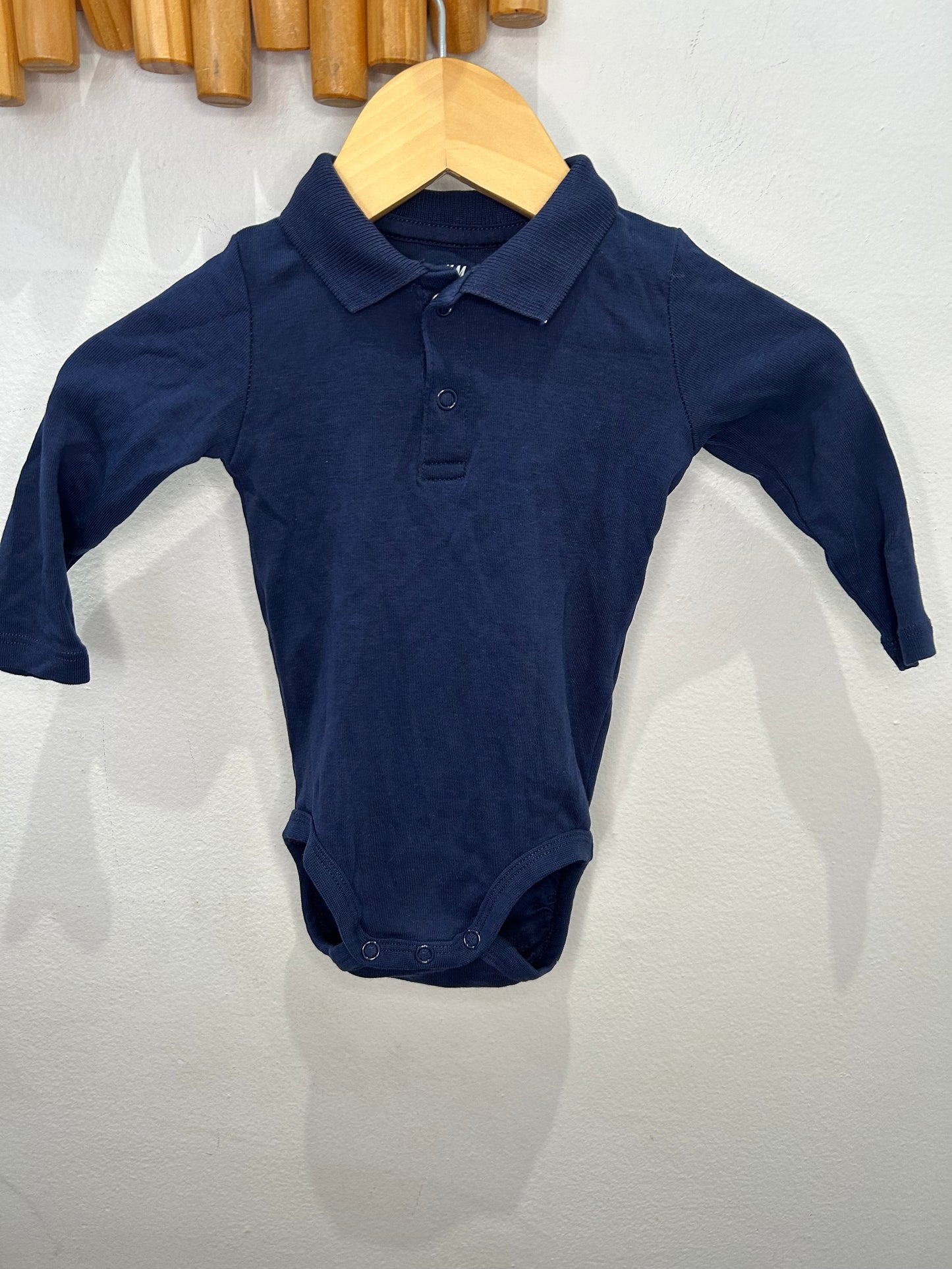 Blue polo onesie 4-6m