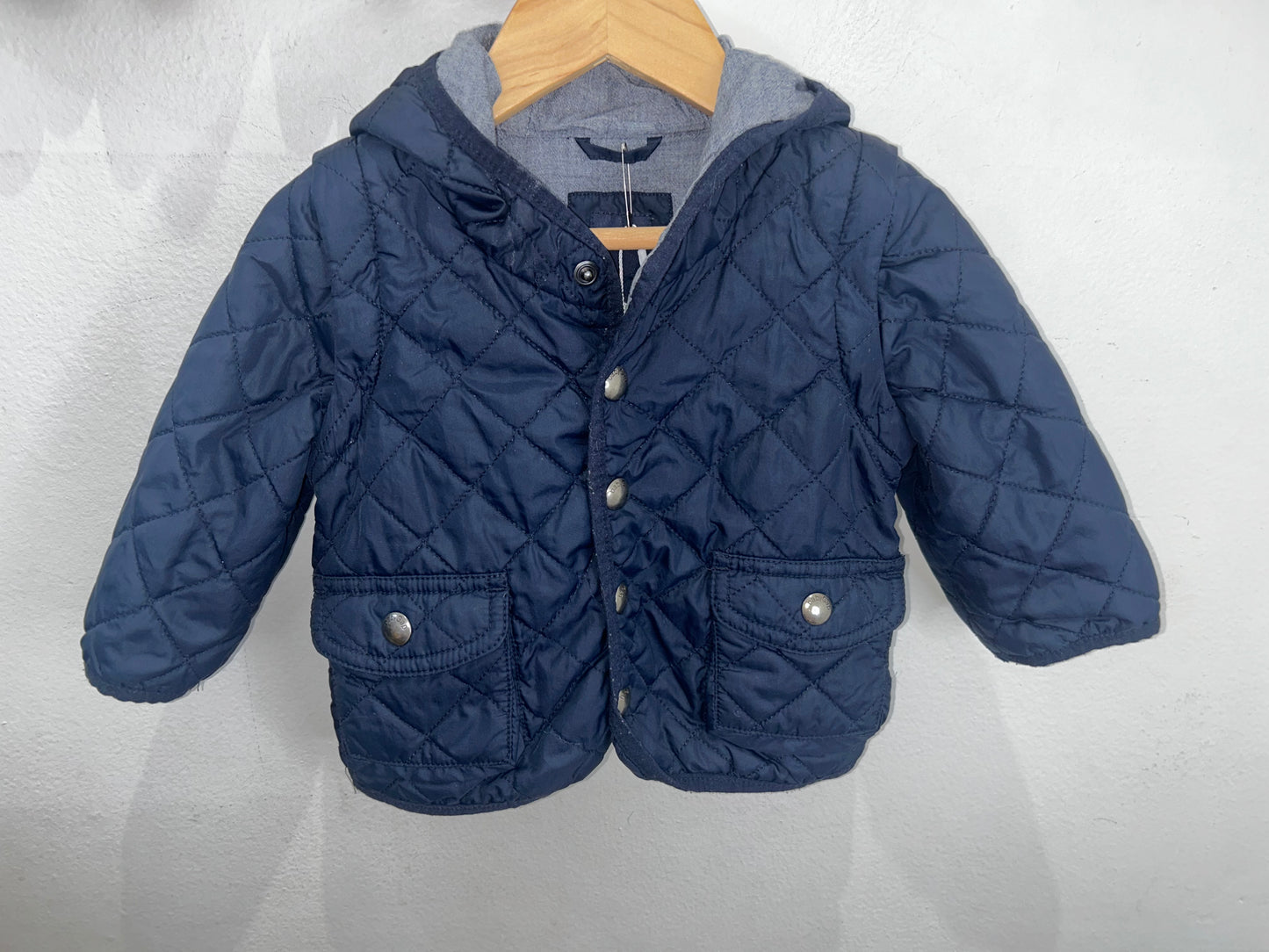 Navy quilted jacket 6-12m