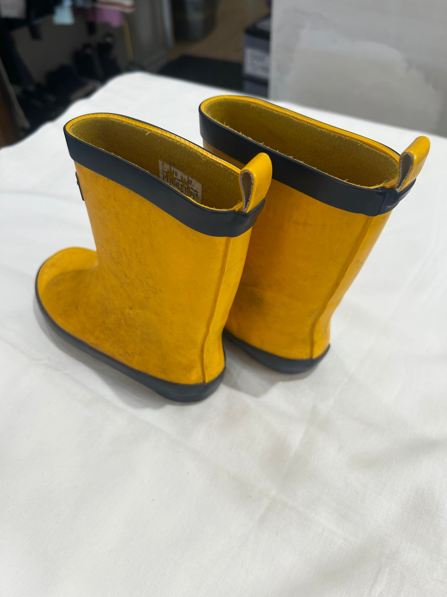 C10 Yellow and navy rain boots