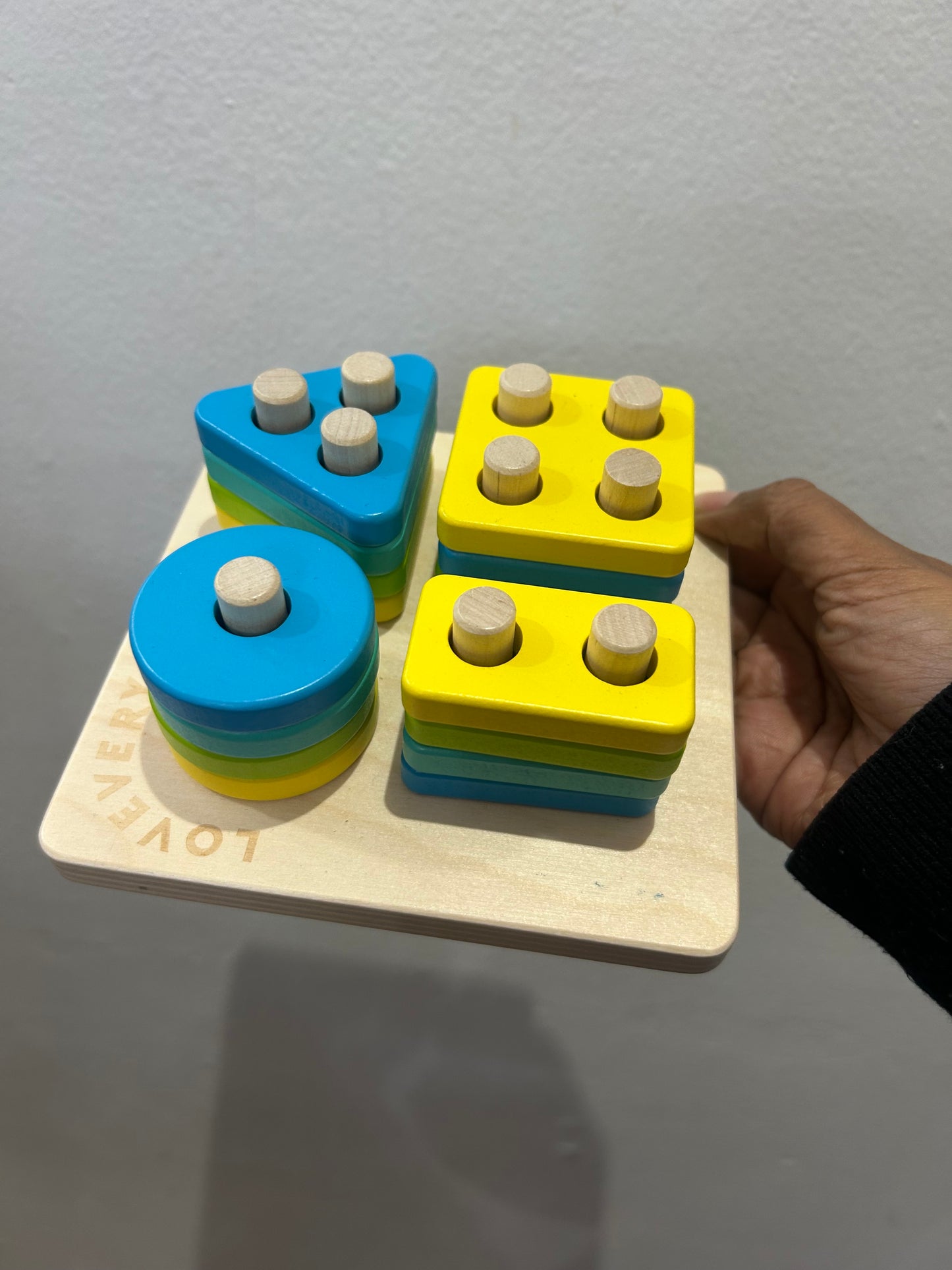 Lovevery sort and stack peg puzzles