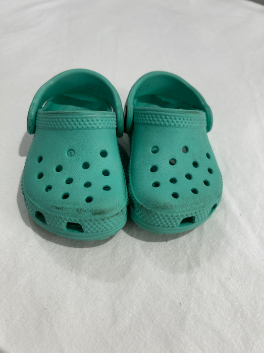 C4 teal Crocs