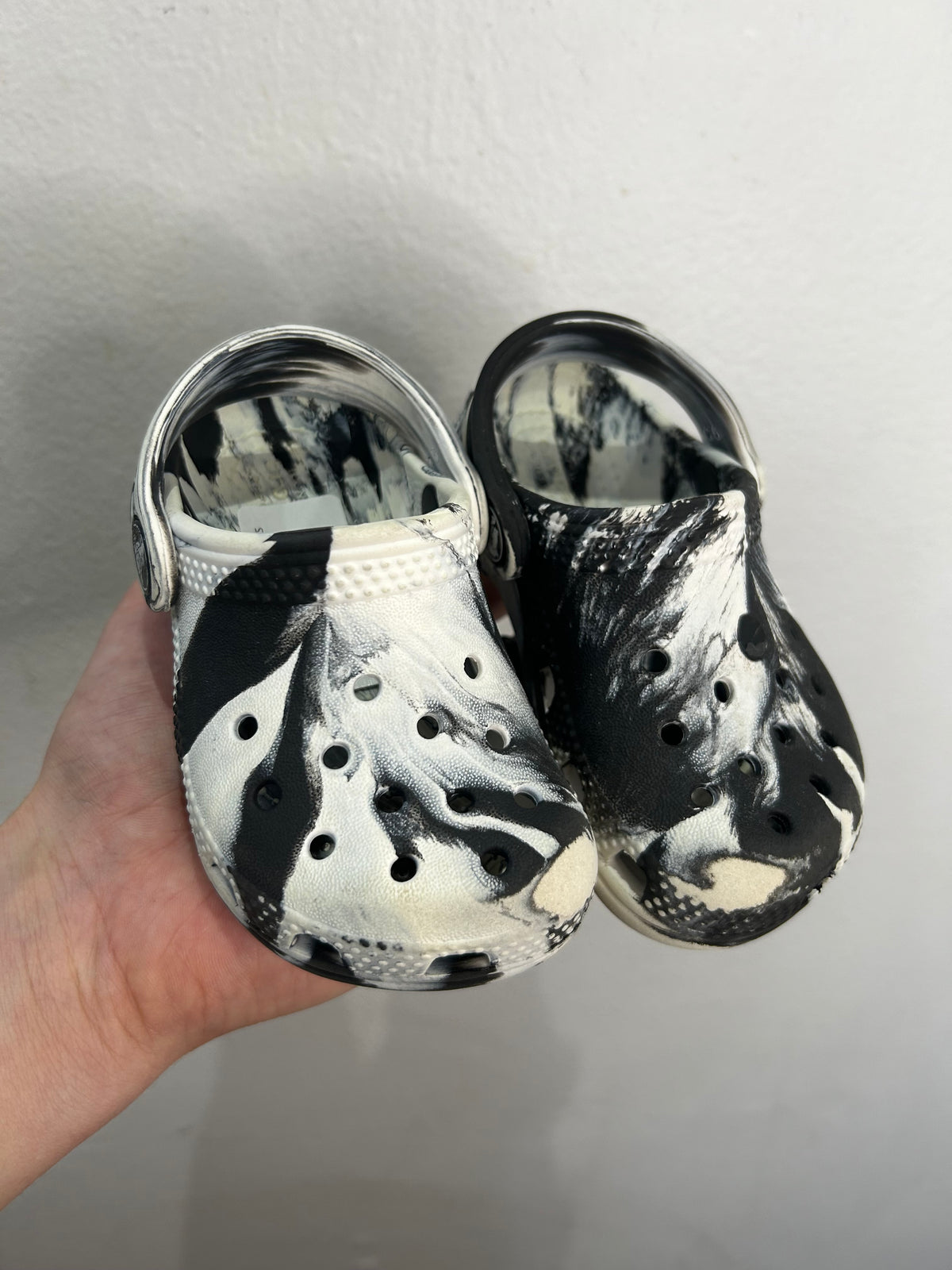 C6 black and white Crocs