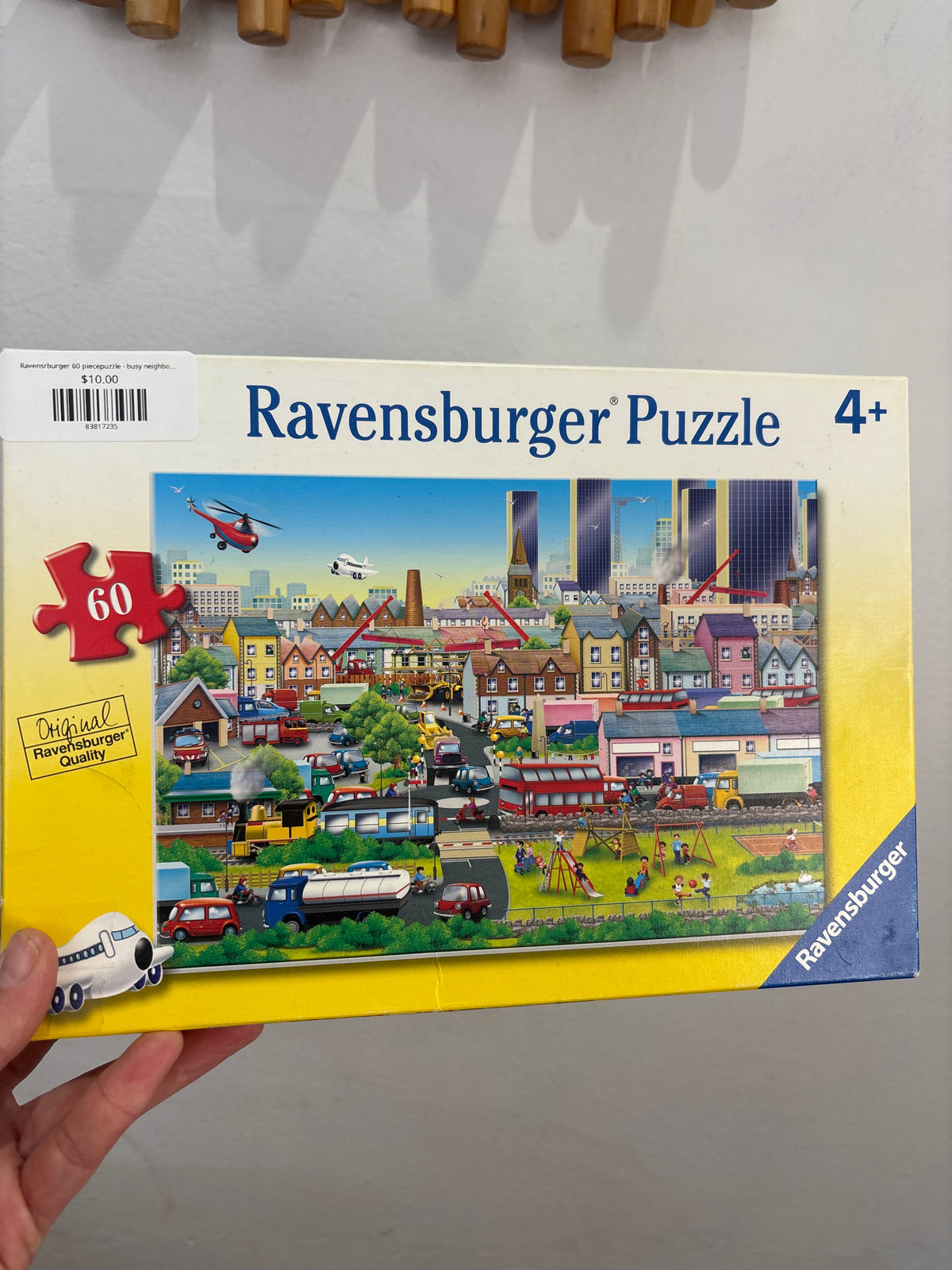 Ravensrburger 60 piecepuzzle - busy neighbourhood