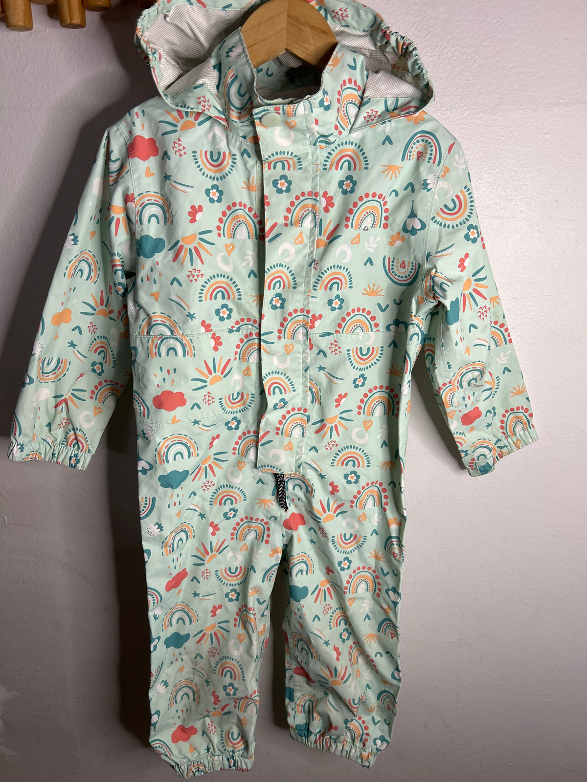Green colourful print rain suit 2y