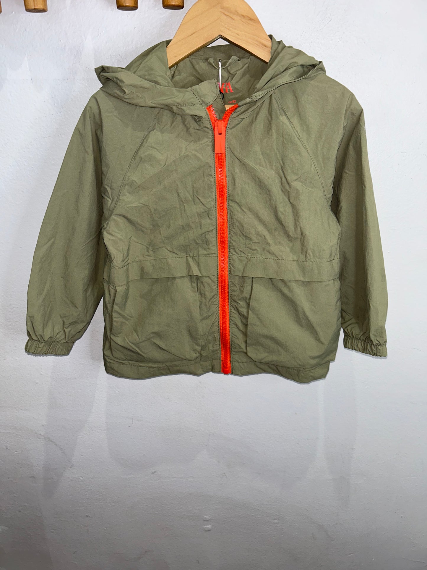 Olive and orange windbreaker 2y