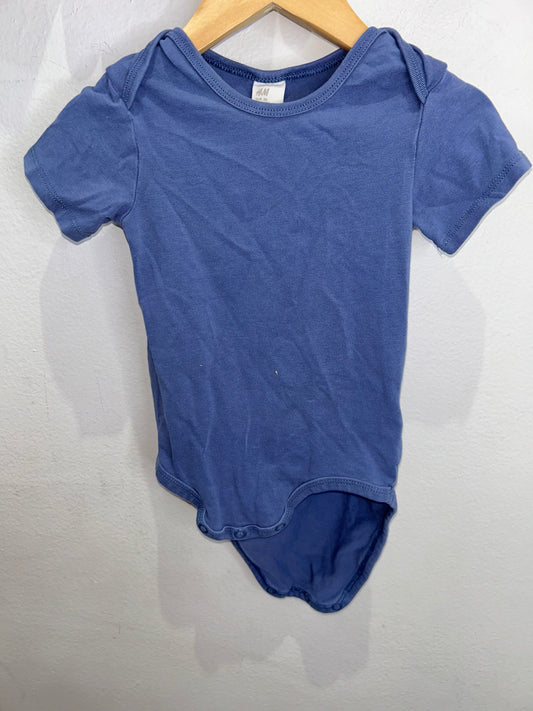 Mute blue onesie 12-18m