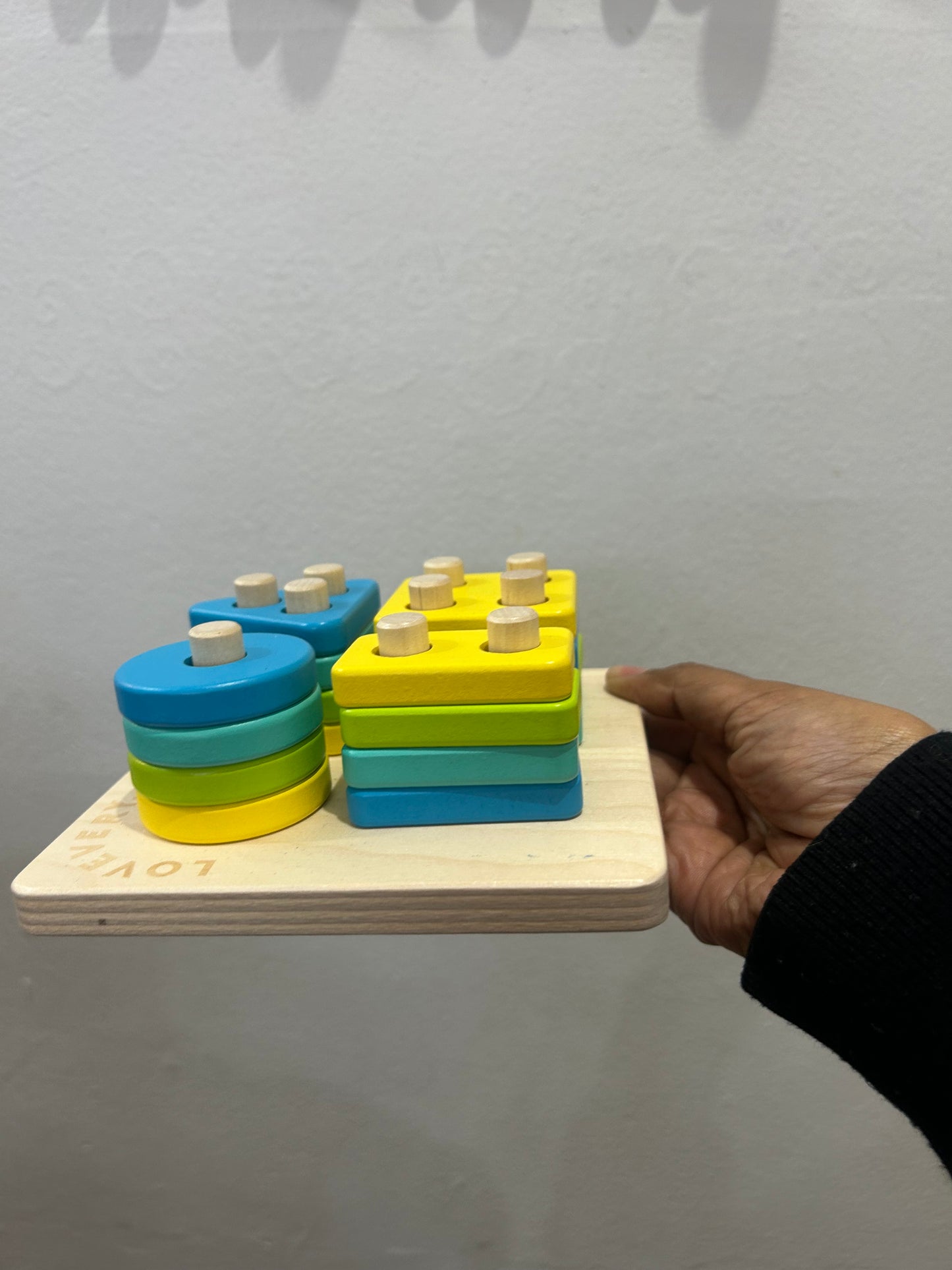 Lovevery sort and stack peg puzzles