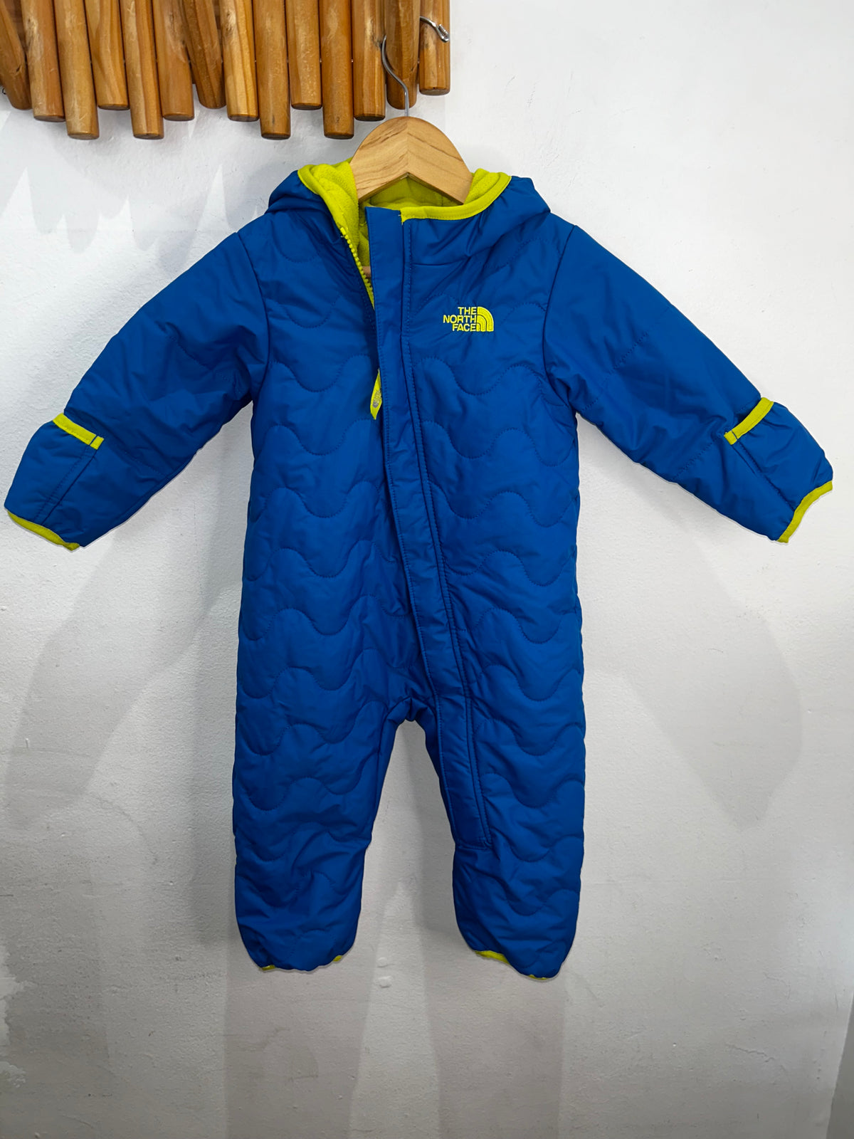 The North Face blue snowsuit 6-12m