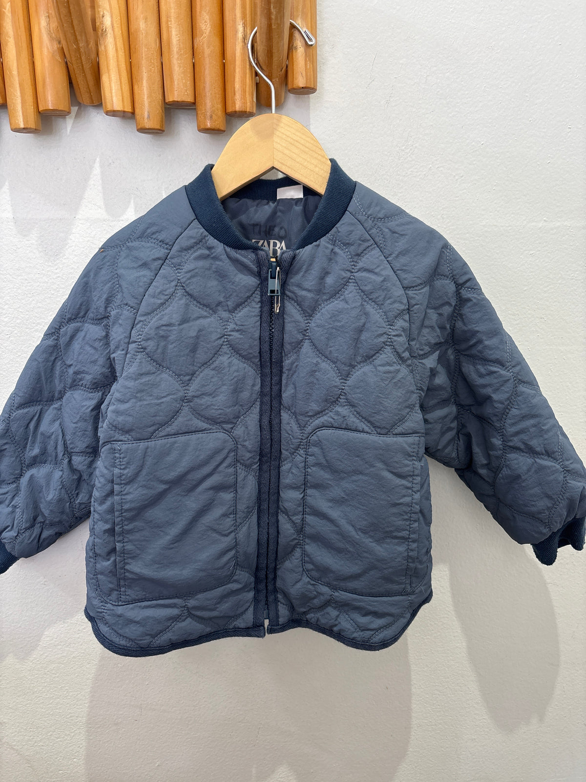 Blue quilted jacket 3y