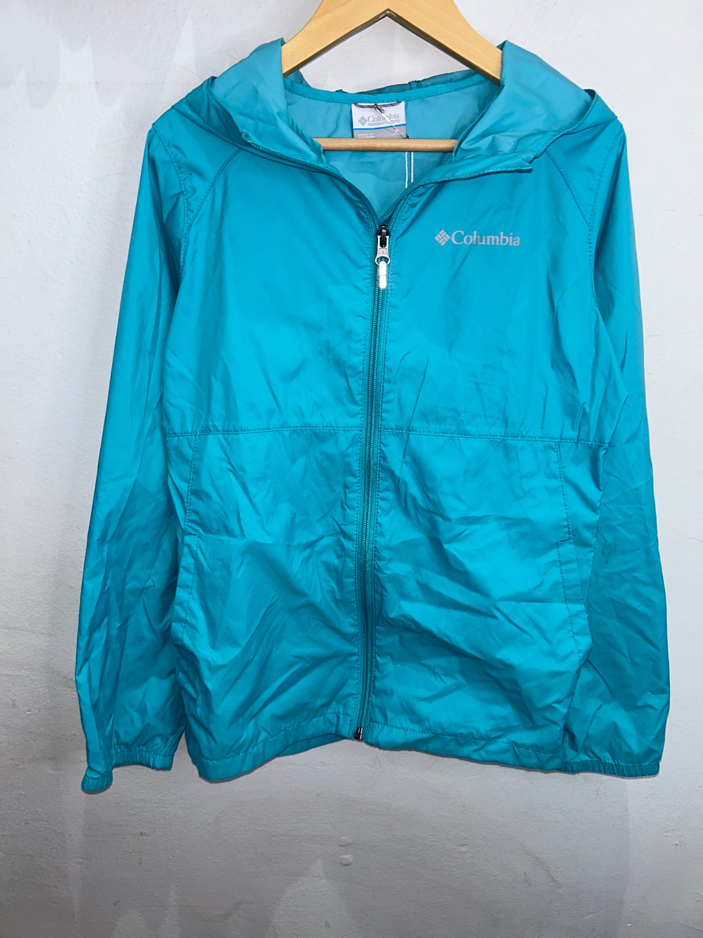 Columbia blue rainjacket 10-12y