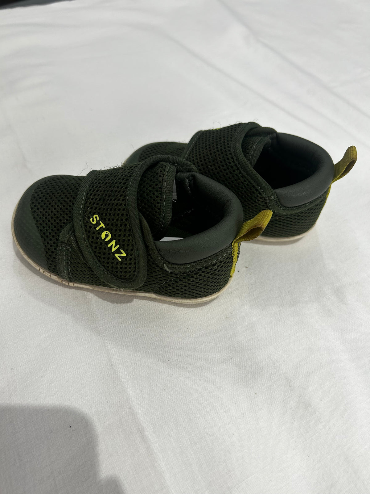 C6 green Stonz shoes