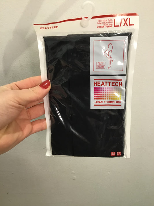 Heat tech leggings-  new in package- adult L/XL