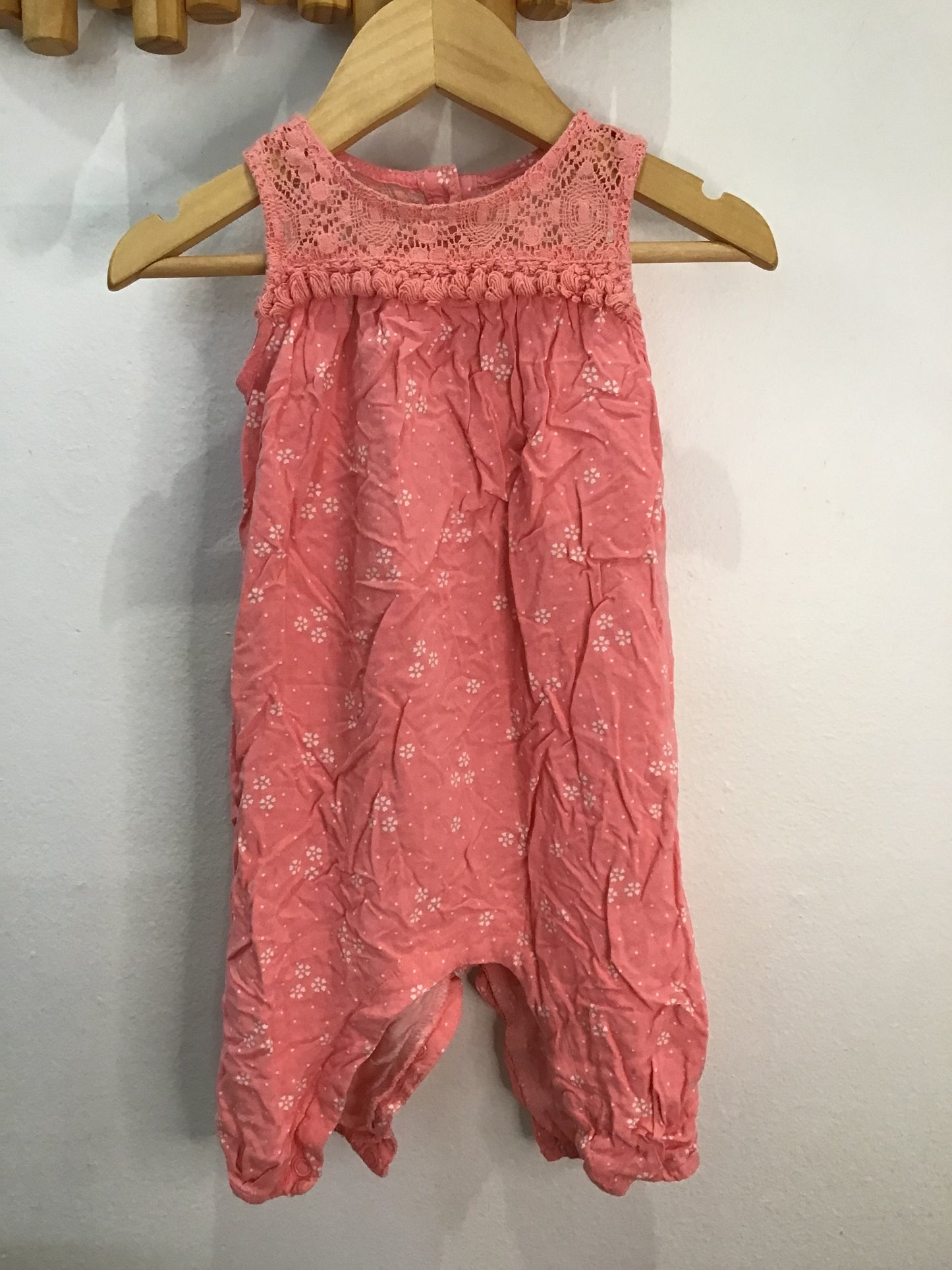 Romper breey peach 6-12m