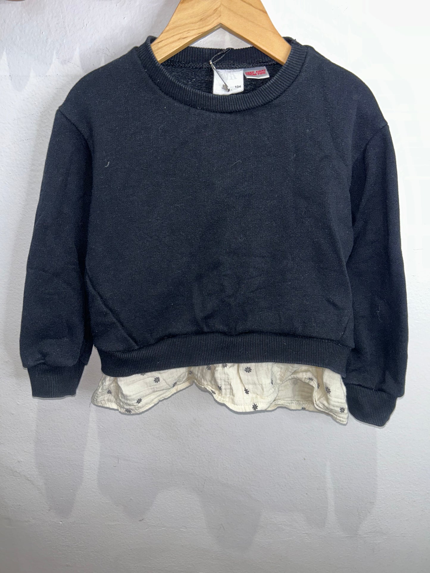 Floral bottom black pullover 3-4y
