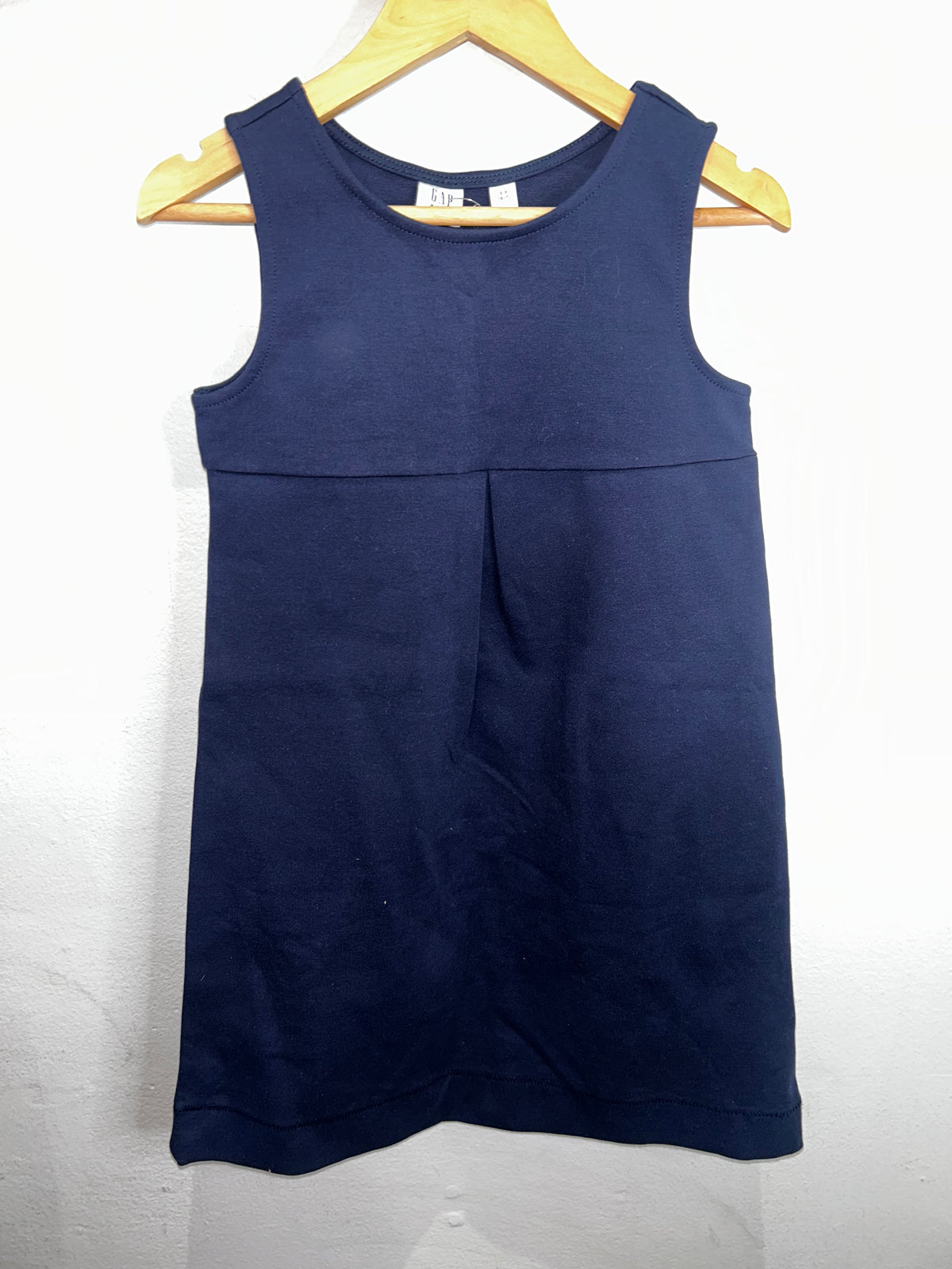 Navy skirt romper 6-7y NEW