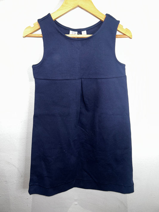 Navy skirt romper 6-7y NEW