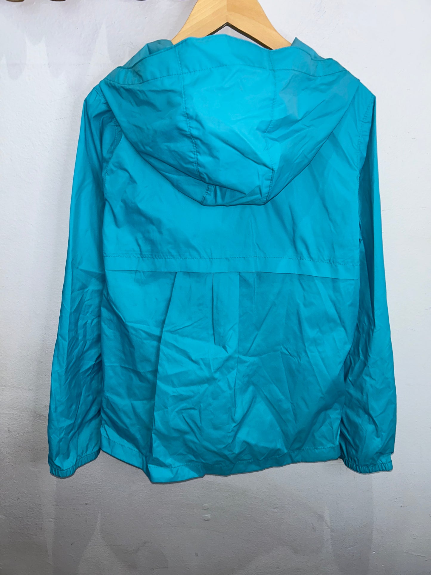 Columbia blue rainjacket 10-12y
