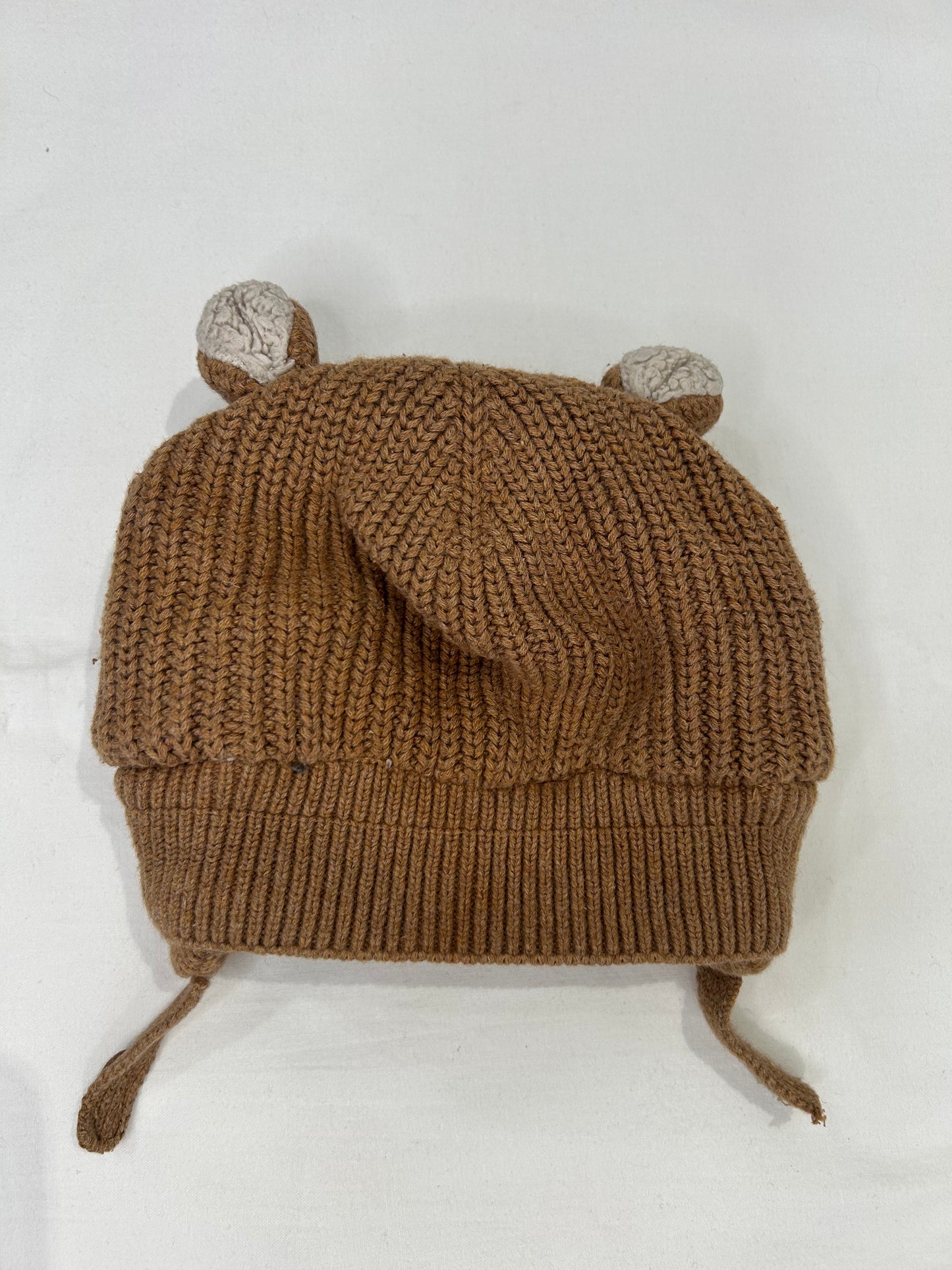 Brown furry lined hat 12-18m