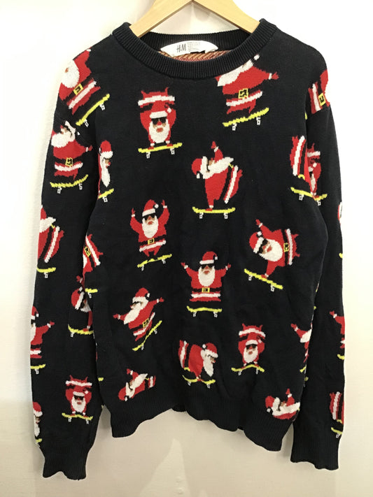 Skateboarding santa sweater 10-12y