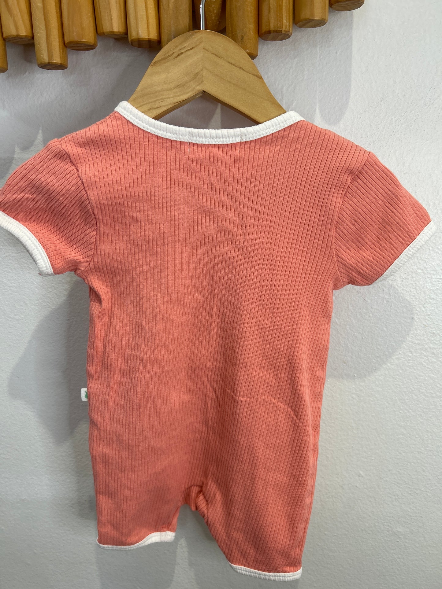 Peach ribbed shorty sleeper 3-6m