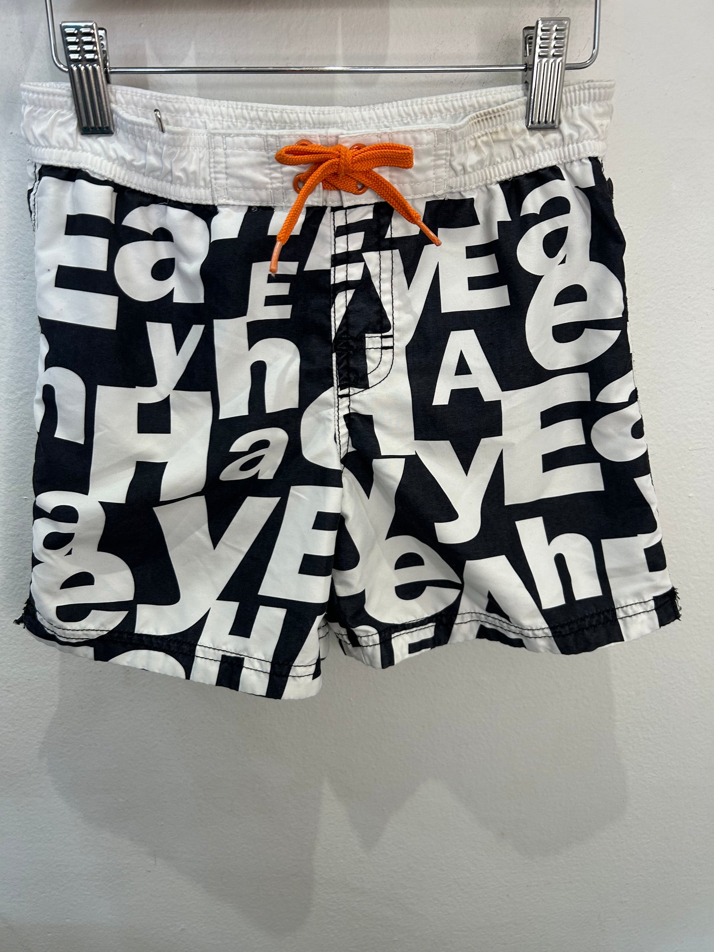 Black and white board shorts 6-8y